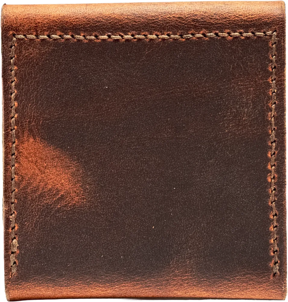 The back of the closed case, one smooth unbroken panel of waxed leather.