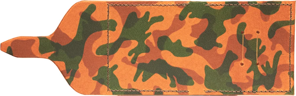 The outside, open flat. Matte camo print across napped leather, stitched in brown thread.