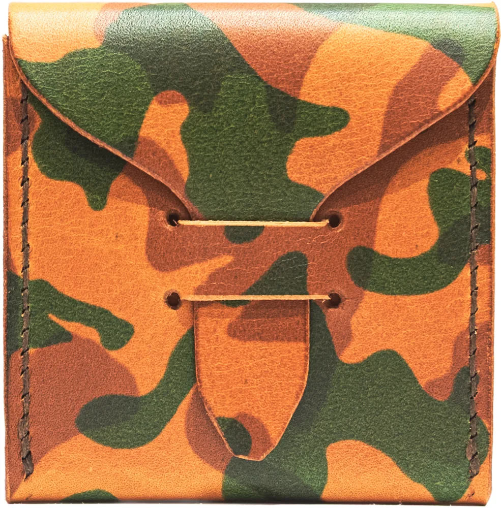 Woodland and Blaze pick case, closed. Camouflage printed onto a soft, napped hide.
